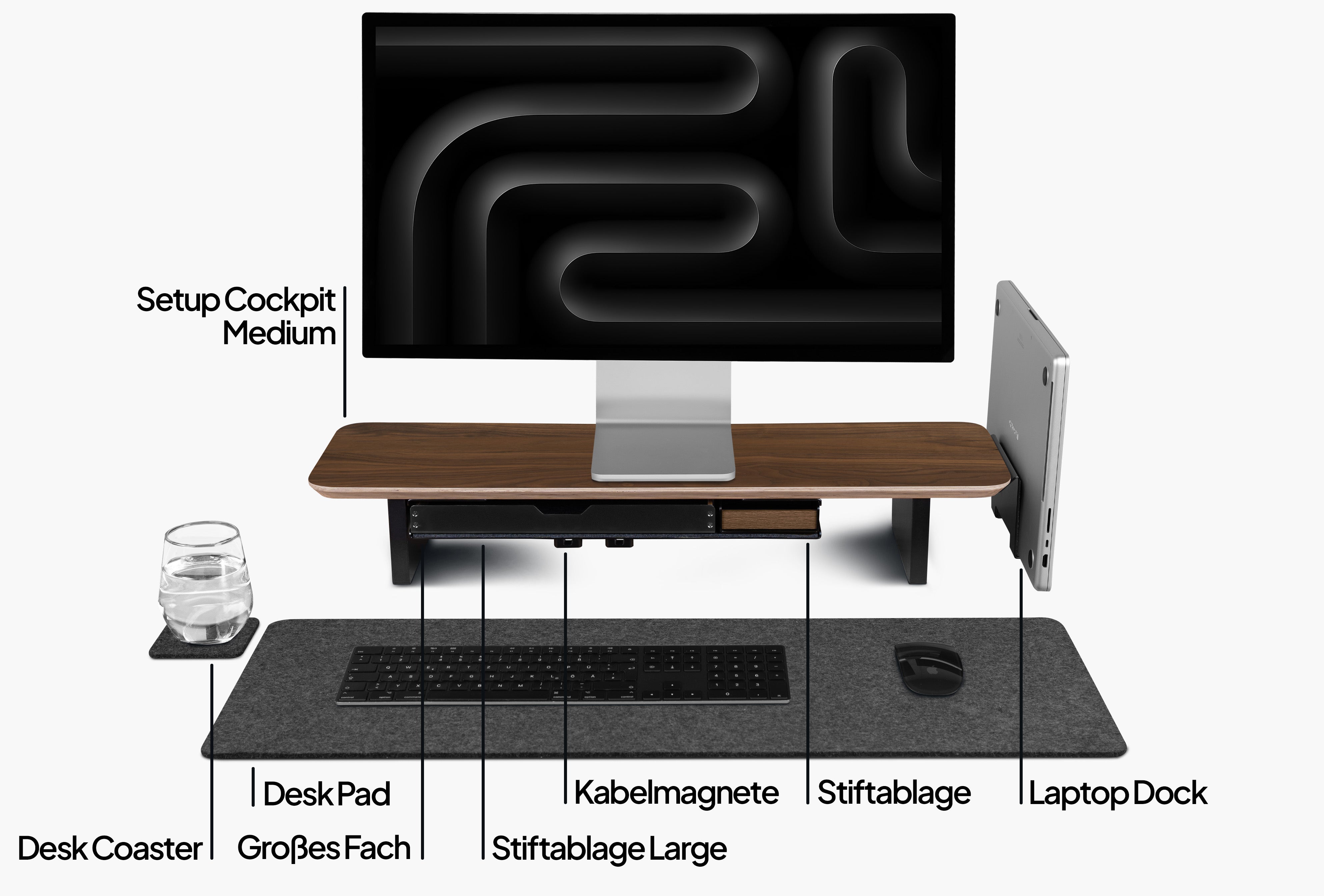 Setup Cockpit Medium aus Nussbaum im Bundle mit Anbauteilen: Laptop Dock, Großes Fach, Kabelmagnete, Desk Pad, Stiftablagen, Desk Coaster. Veranschaulicht mit Beschriftungen. 