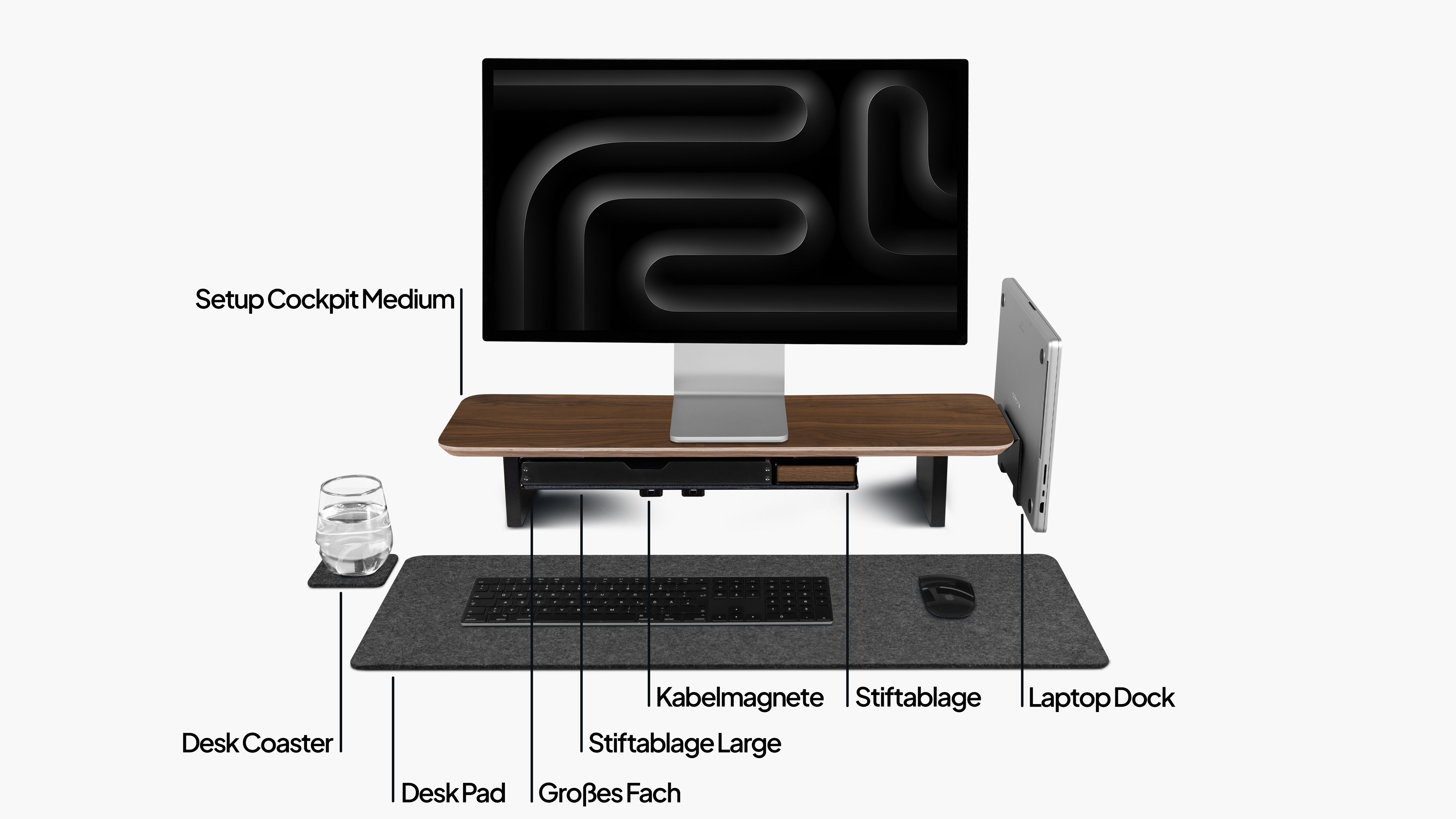 Setup Cockpit Medium aus Nussbaum im Bundle mit Anbauteilen: Laptop Dock, Großes Fach, Kabelmagnete, Desk Pad, Stiftablagen, Desk Coaster. Veranschaulicht mit Beschriftungen. 